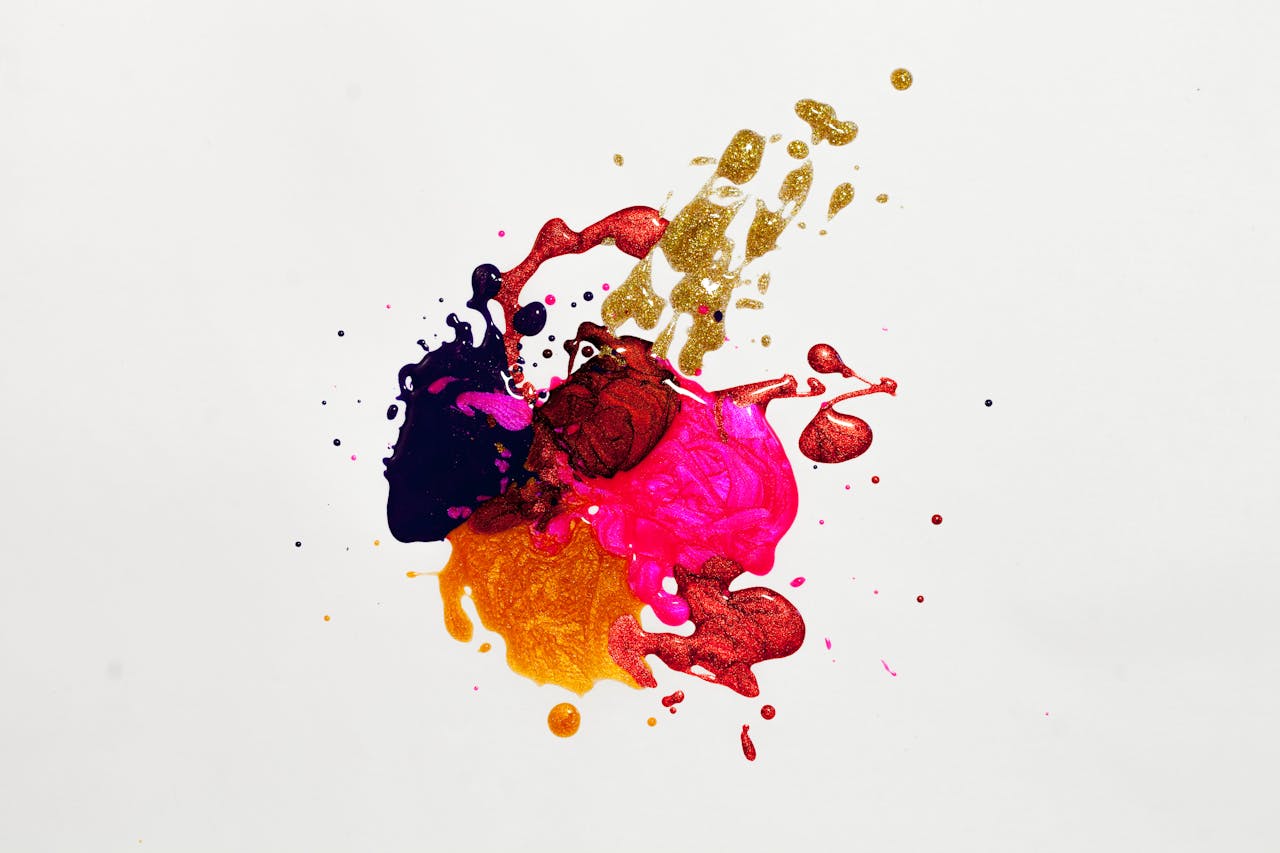 Strona Główna Colorful abstract paint splash on white background, capturing creative expression.